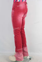 Red acid washed skinny jeans