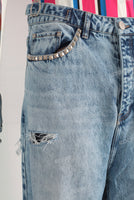 Blue baggy damaged jeans