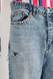 Blue baggy damaged jeans