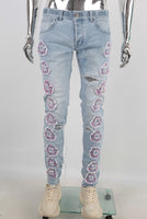Blue embroidered patchwork damaged jeans