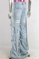 Blue damaged patchwork boot cut jeans