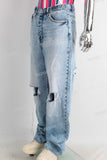 Blue baggy damaged jeans