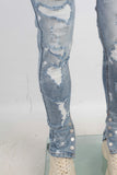 Blue damaged skinny jeans