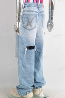 Blue baggy damaged jeans