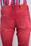 Red acid washed slim fit jeans