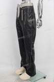 Black leather stitching zipper bell bottom jeans