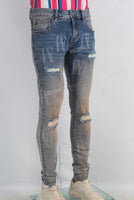 Acid washed damaged laser skinny jeans