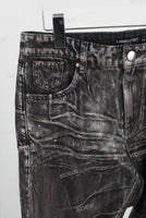 Black acid washed raw hem bell bottom jeans