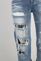 Blue damaged patchwork flare jeans