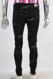 Black damage skinny denim jeans